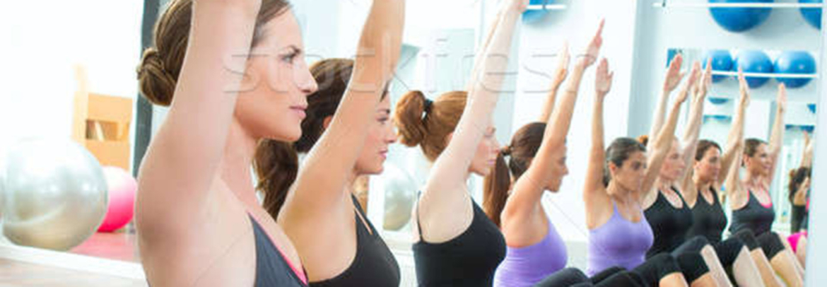 2135137_stock-photo-aerobic-pilates-personal-trainer-in-a-gym-group-class.jpg